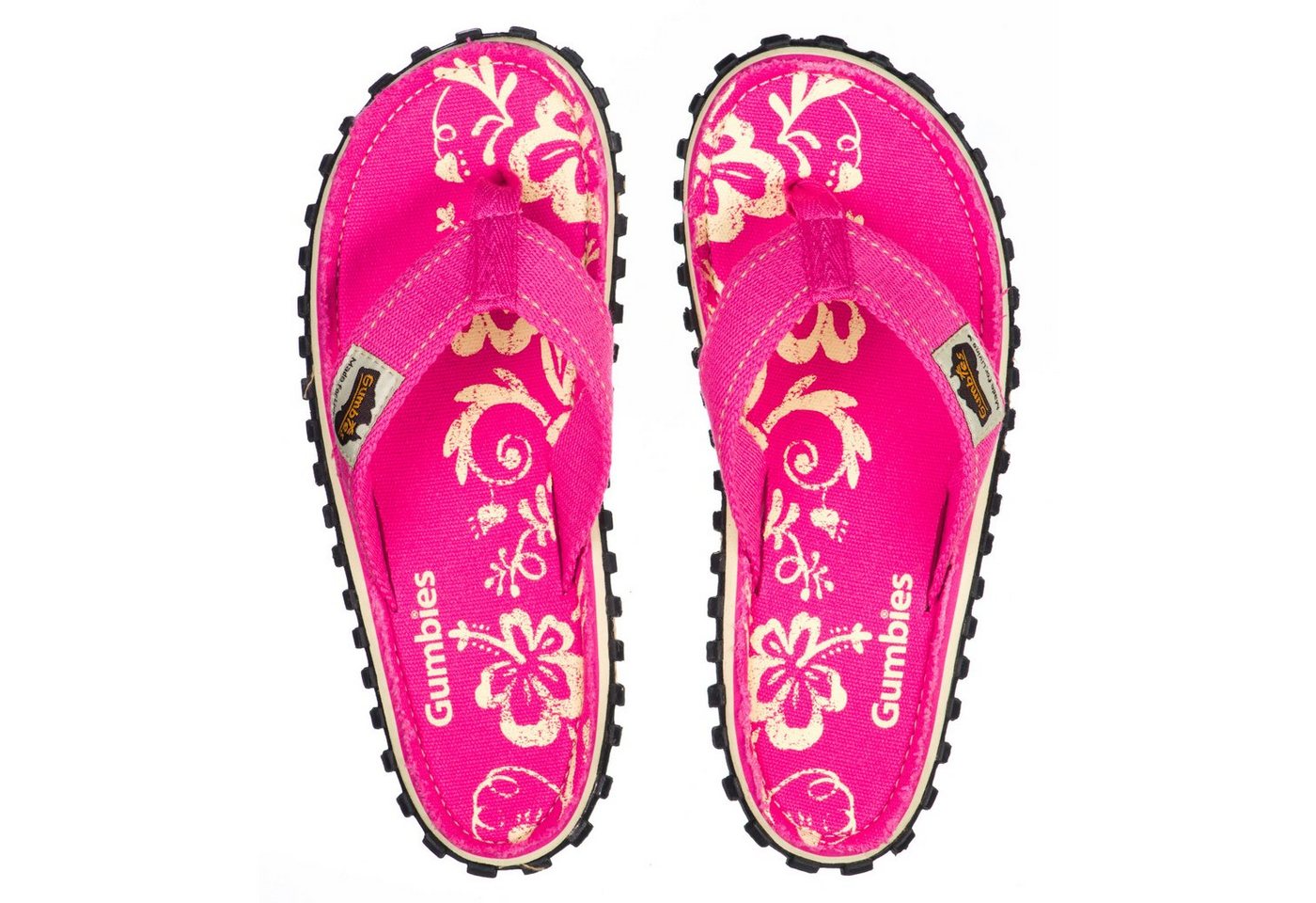 Gumbies Original in Pink Hibiscus T-Strap-Zehentrenner aus recycelten Materialien hergestellt, stabile Gummisole